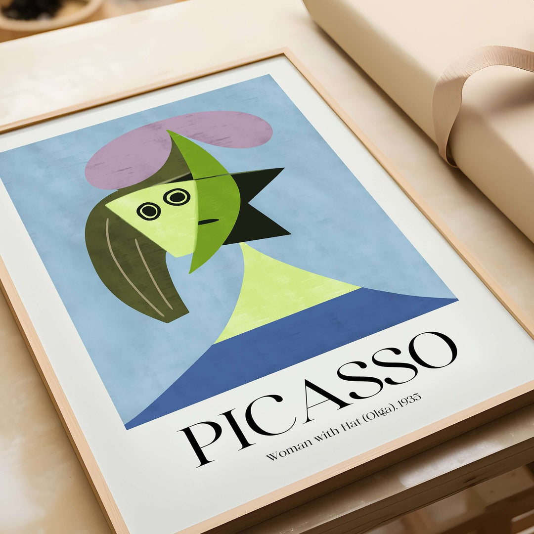Picasso abstract art print 'Woman with Hat (Olga) 1935', featuring geometric shapes and vibrant colors in a minimalist style.