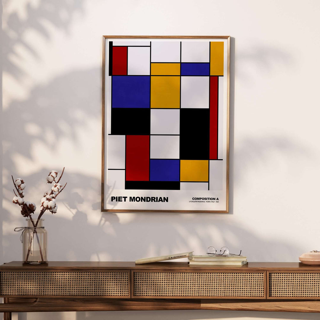 Piet Mondrian Composition A abstract art print showcasing geometric shapes and primary colors in a stylish frame.