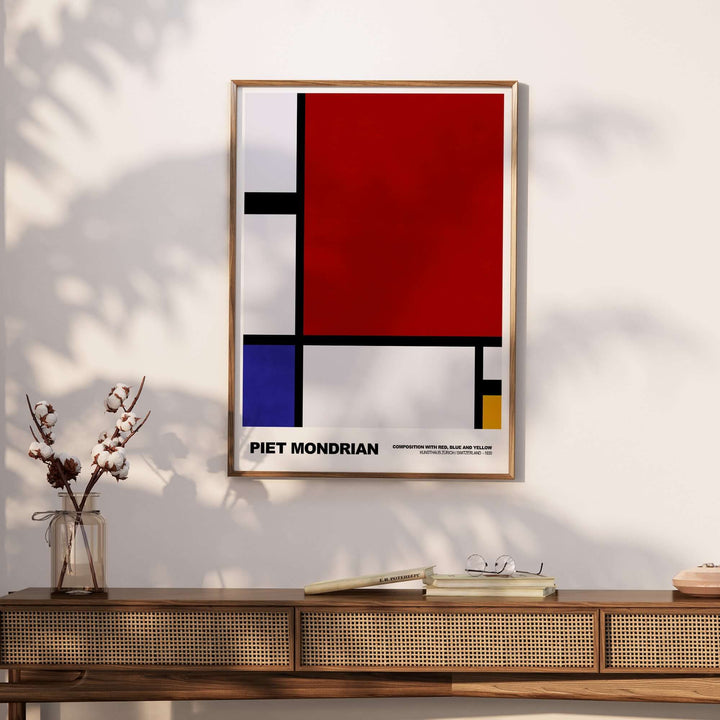 Piet Mondrian 1930 abstract art print poster showcasing red, blue, and yellow geometric design in a modern frame.