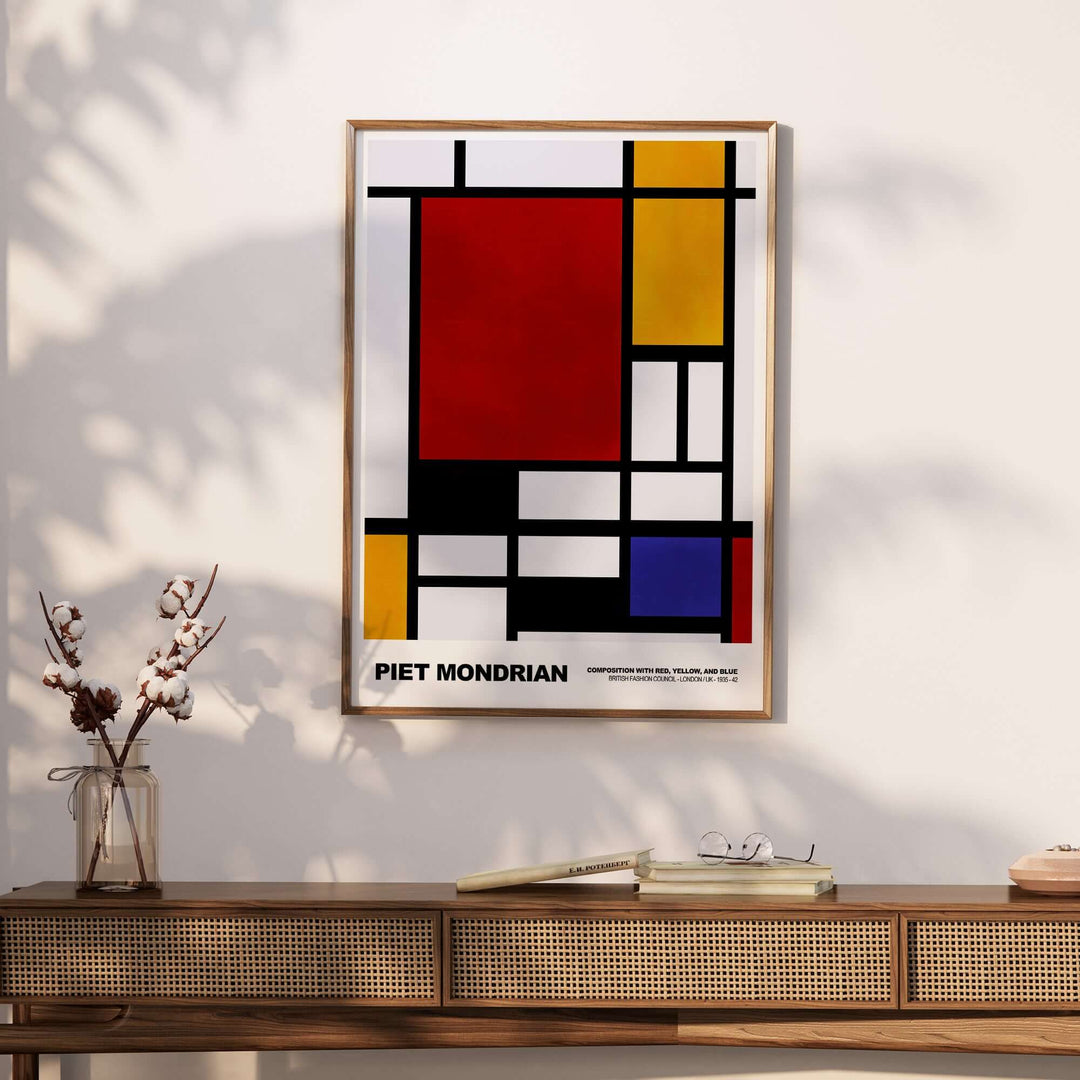 Piet Mondrian Composition Red Yellow Blue 1939 abstract art poster framed on a wall with minimalistic decor.