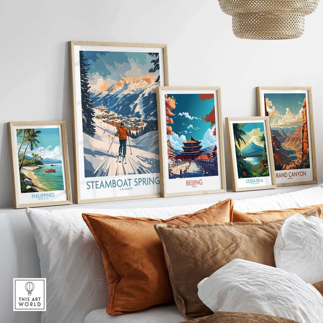 Steamboat Springs ski poster surrounded by travel posters for Philippines, Beijing, Costa Rica, and Grand Canyon in a cozy room setting.