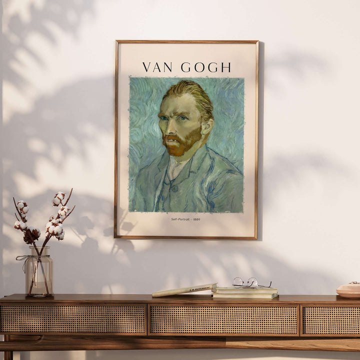 Vincent van Gogh Self Portrait 1889 art print framed on wall, showcasing expressive brushstrokes in blue and green.
