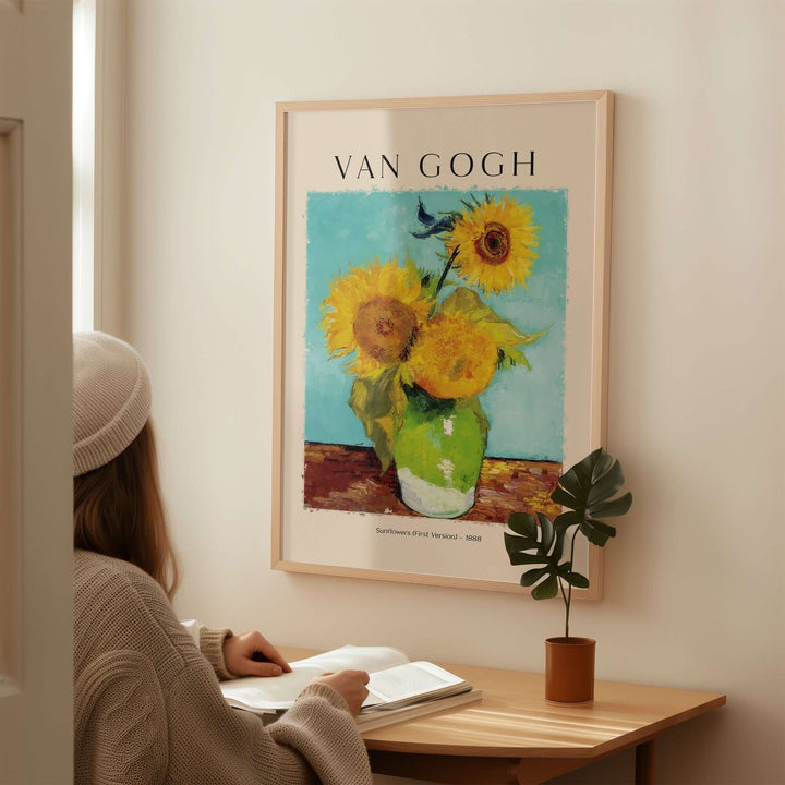 Vincent van Gogh Sunflowers (First Version) 1888 art print poster displayed in a stylish interior setting with a person reading.