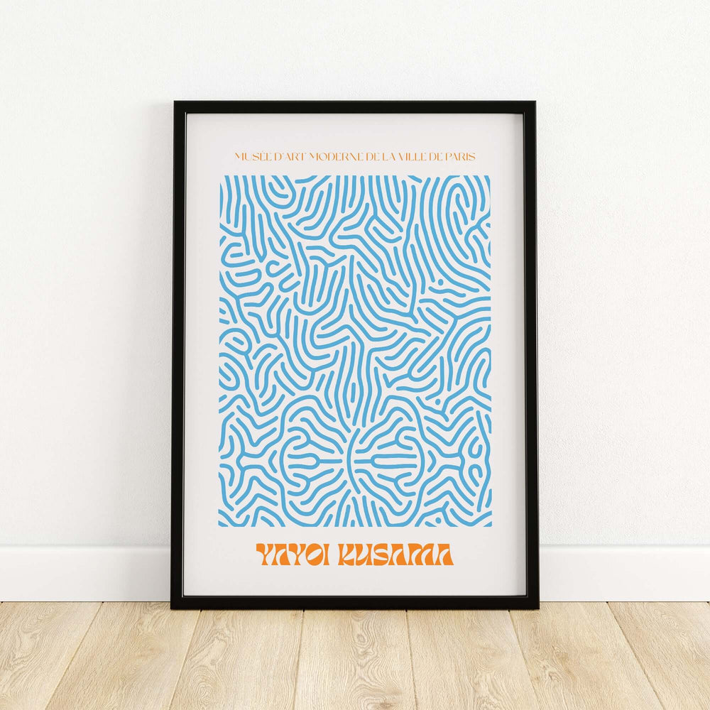 Yayoi Kusama Blue Infinity Net Abstract Art Print Poster framed on a wooden floor, showcasing modern Japanese art.