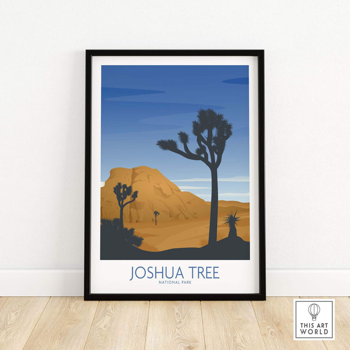 Joshua Tree National Park art print in a black frame featuring minimalist desert landscape and blue sky.