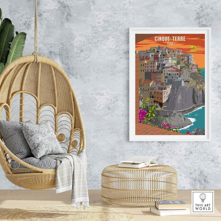 Cinque Terre Italy vintage poster print displayed in a stylish interior with a hanging chair and decorative elements.