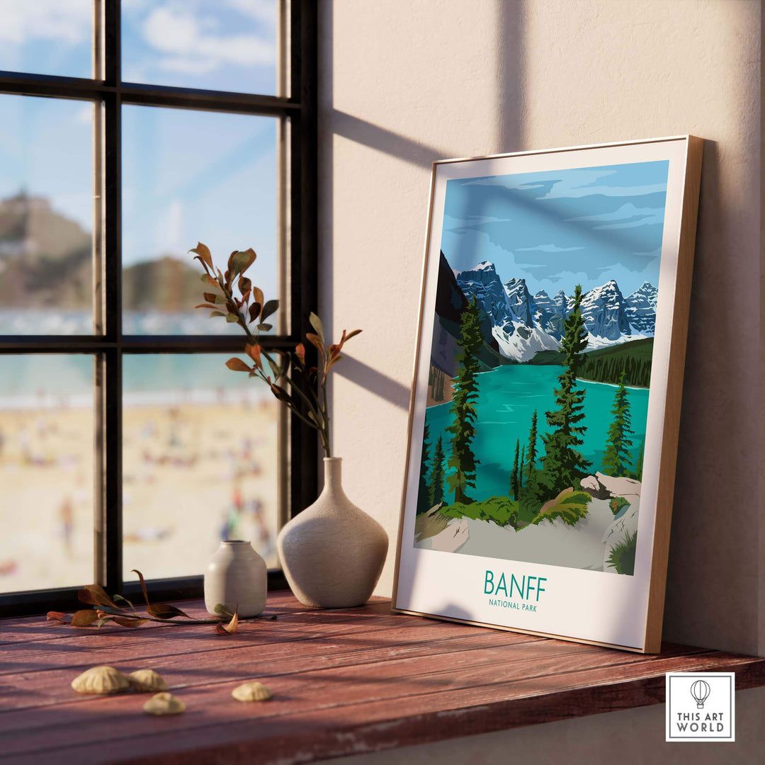 Banff National Park vintage poster print displayed on a wooden shelf with a view of the outdoors.