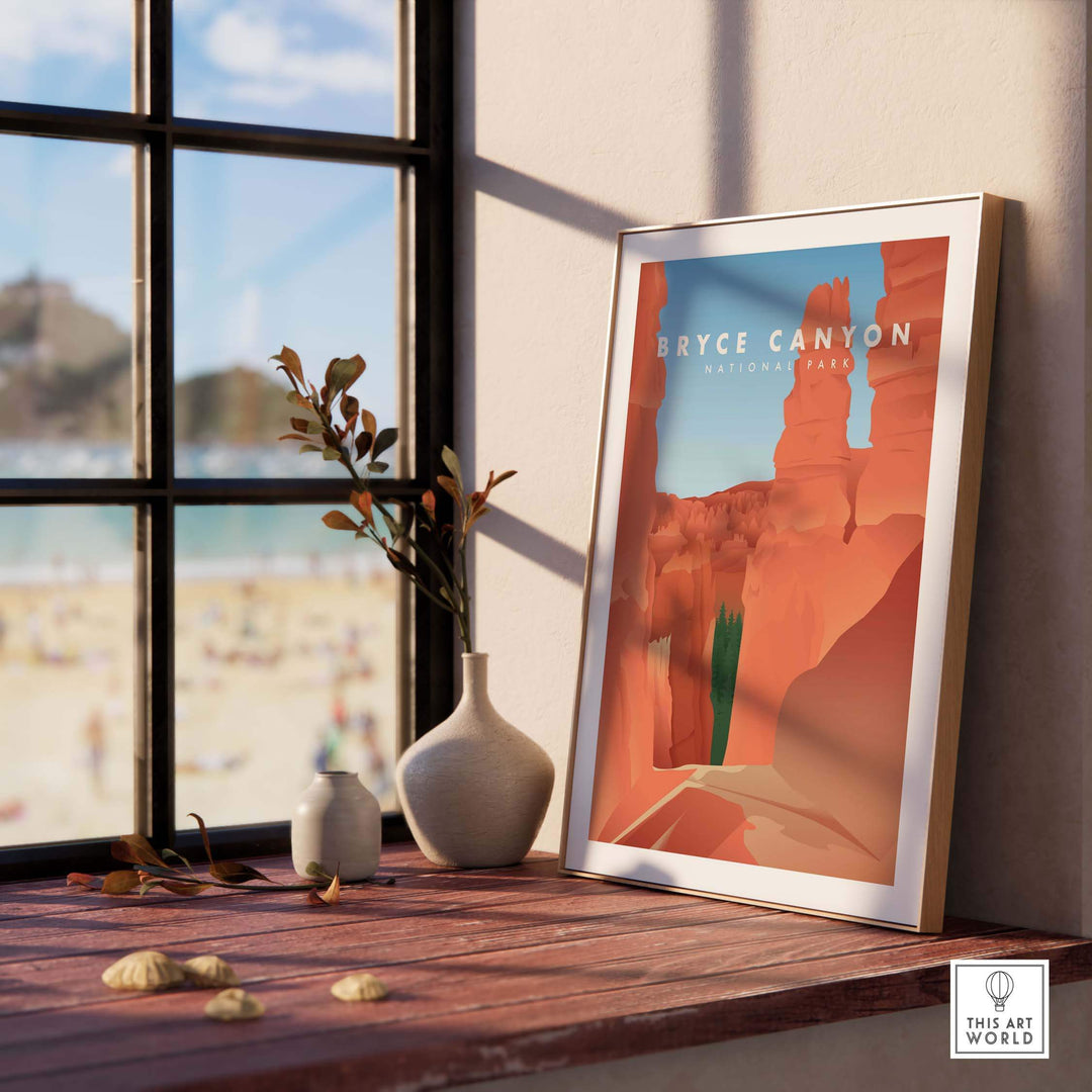 Framed Bryce Canyon National Park art print on a table with a beach view, perfect for travel-inspired decor.