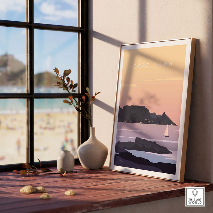 Cape Town print wall art poster displayed on a wooden table, showcasing scenic landscape and vintage design.