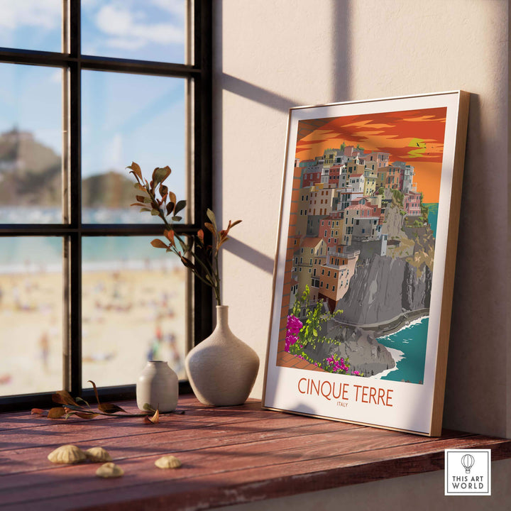 Framed Cinque Terre Print displaying vibrant coastal scenery near a beach, perfect for home or office decor.