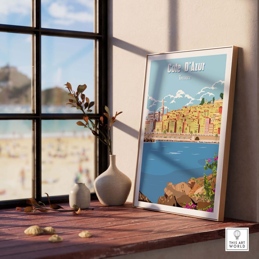 Cote d'Azur poster print wall art displayed in a sunlit room, capturing the beauty of French coastline.
