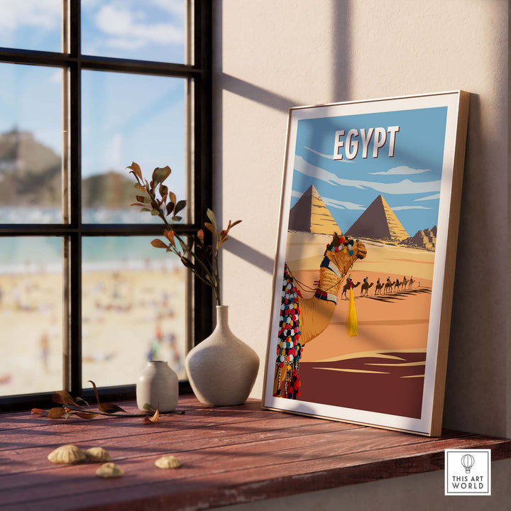 Framed Egypt Wall Art Print showcasing the pyramids and a traveler in a minimalist style, perfect for home decor.