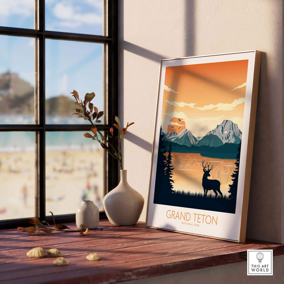 Grand Teton National Park poster art print displayed indoors, featuring mountains and a deer silhouette.