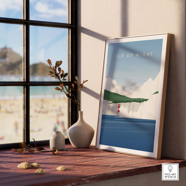 Isle of Wight Wall Art Poster displayed on a wooden table by a window, showcasing nostalgic travel vibes.