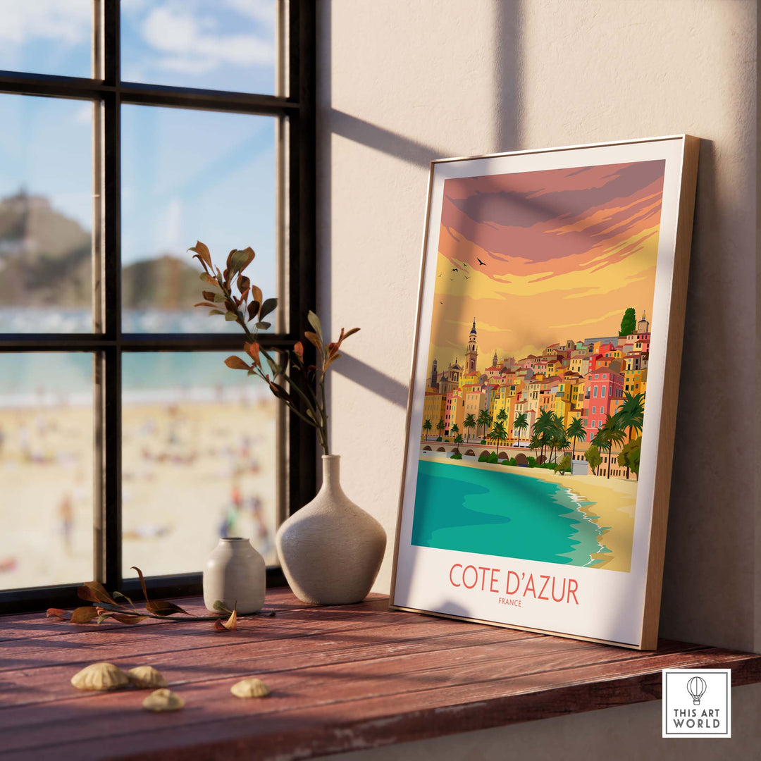 Cote d'Azur print displayed in a stylish interior, capturing the French Riviera's colorful seaside charm.