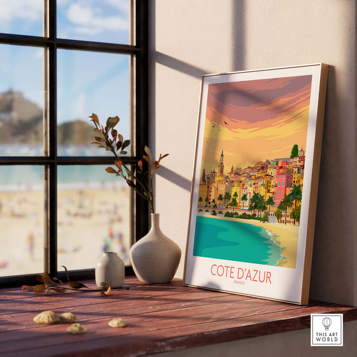 Cote d'Azur print displayed in a stylish interior, capturing the French Riviera's colorful seaside charm.
