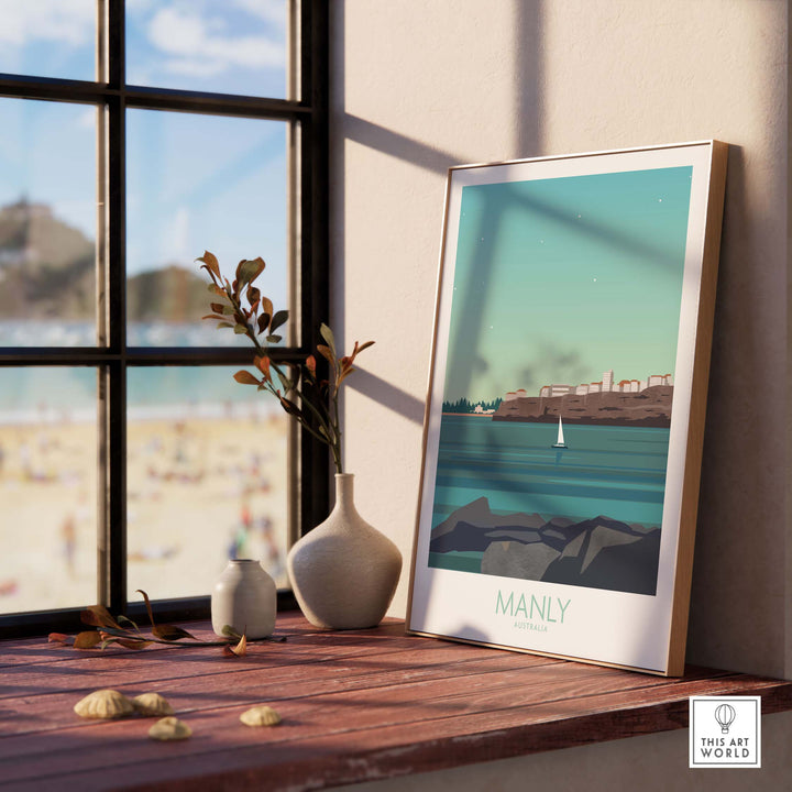 Manly Australia travel poster displayed indoors, showcasing coastal scenery with a vintage aesthetic.