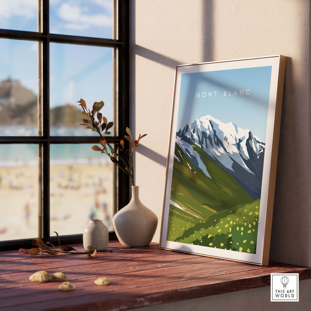 Mont Blanc travel poster print on a windowsill, showcasing a minimalist design and vibrant nature scene.