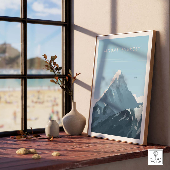 Mount Everest poster displayed by a window showcasing stunning Himalayas art in a cozy room setting.
