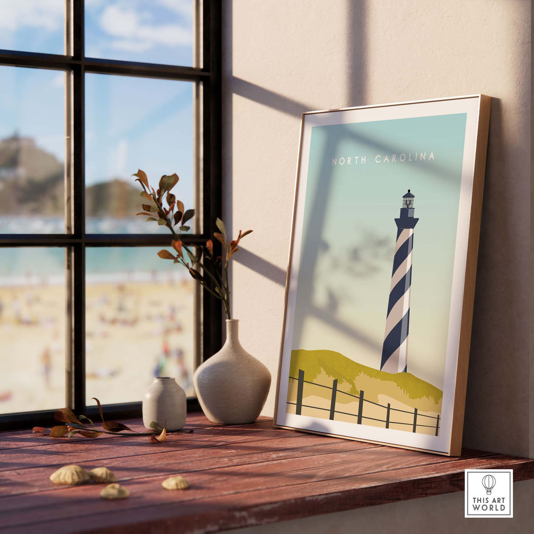 North Carolina Travel Poster Print featuring a lighthouse, displayed in a sunny room with beach view.