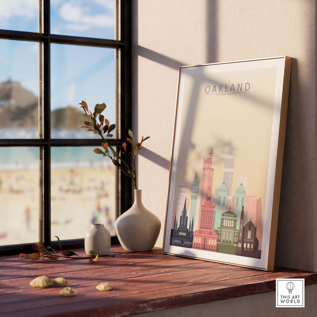 Oakland skyline wall art print displayed indoors, featuring pastel buildings and a beach view through the window.