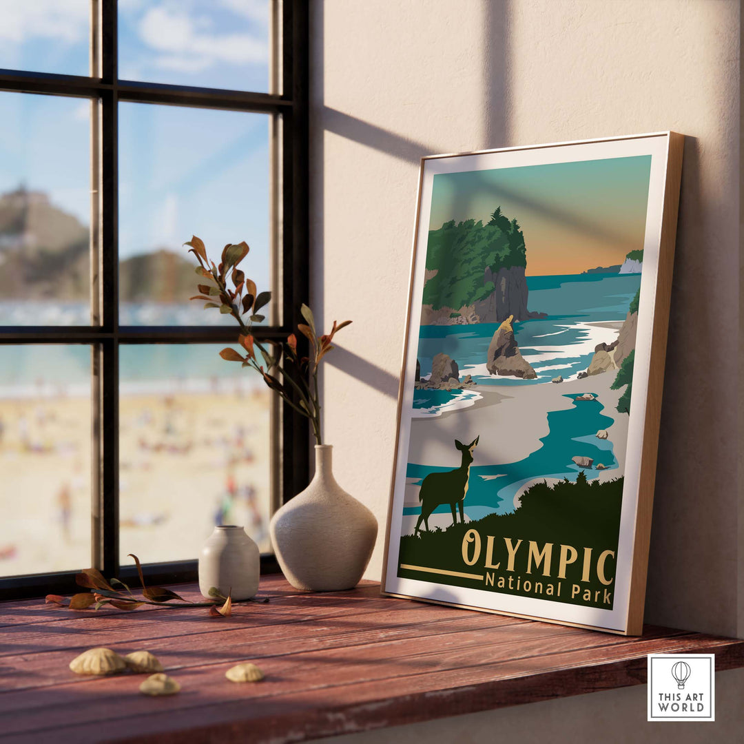 Framed Olympic National Park print on a wooden table with a beach view, capturing vintage travel art style.