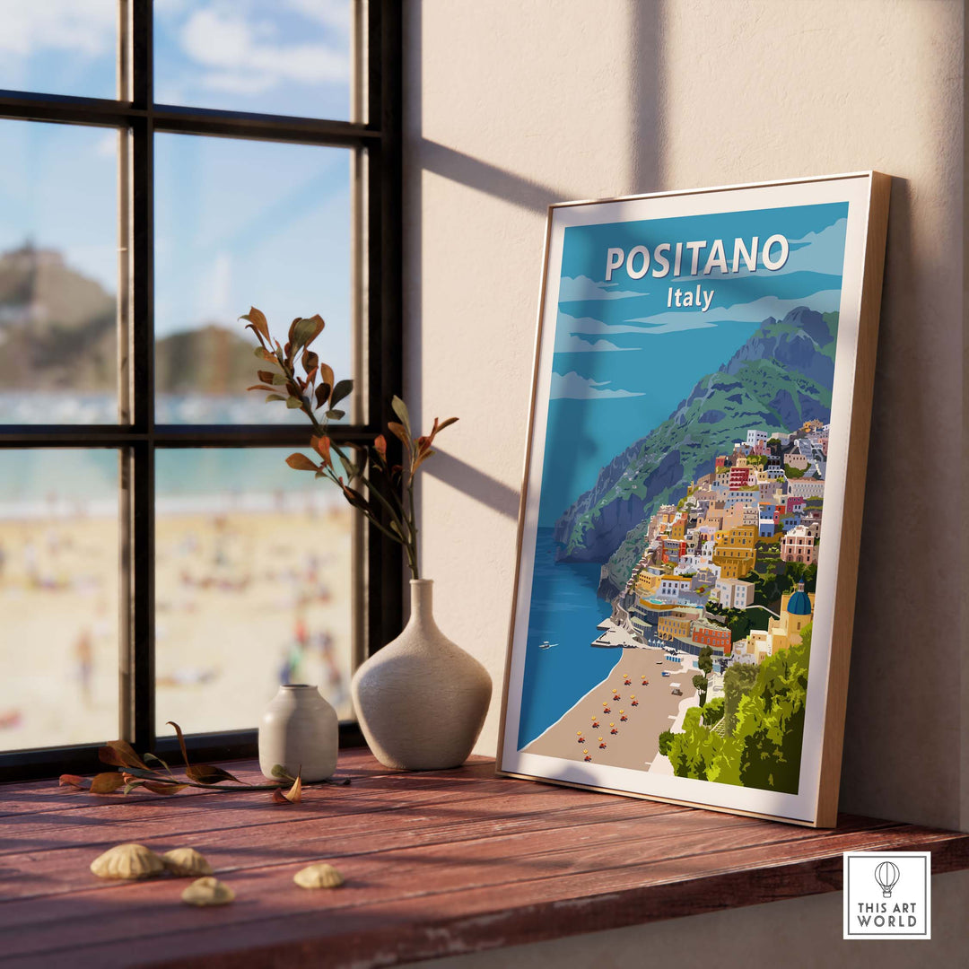 Positano Poster Print Italy Wall Art in a stylish setting with a beach view, perfect for travel enthusiasts.