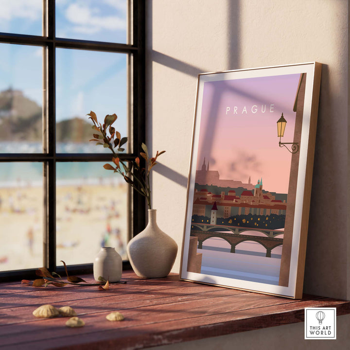 Framed Prague Print Wall Art Poster on table with sunset view, perfect for home decor and travel enthusiasts.