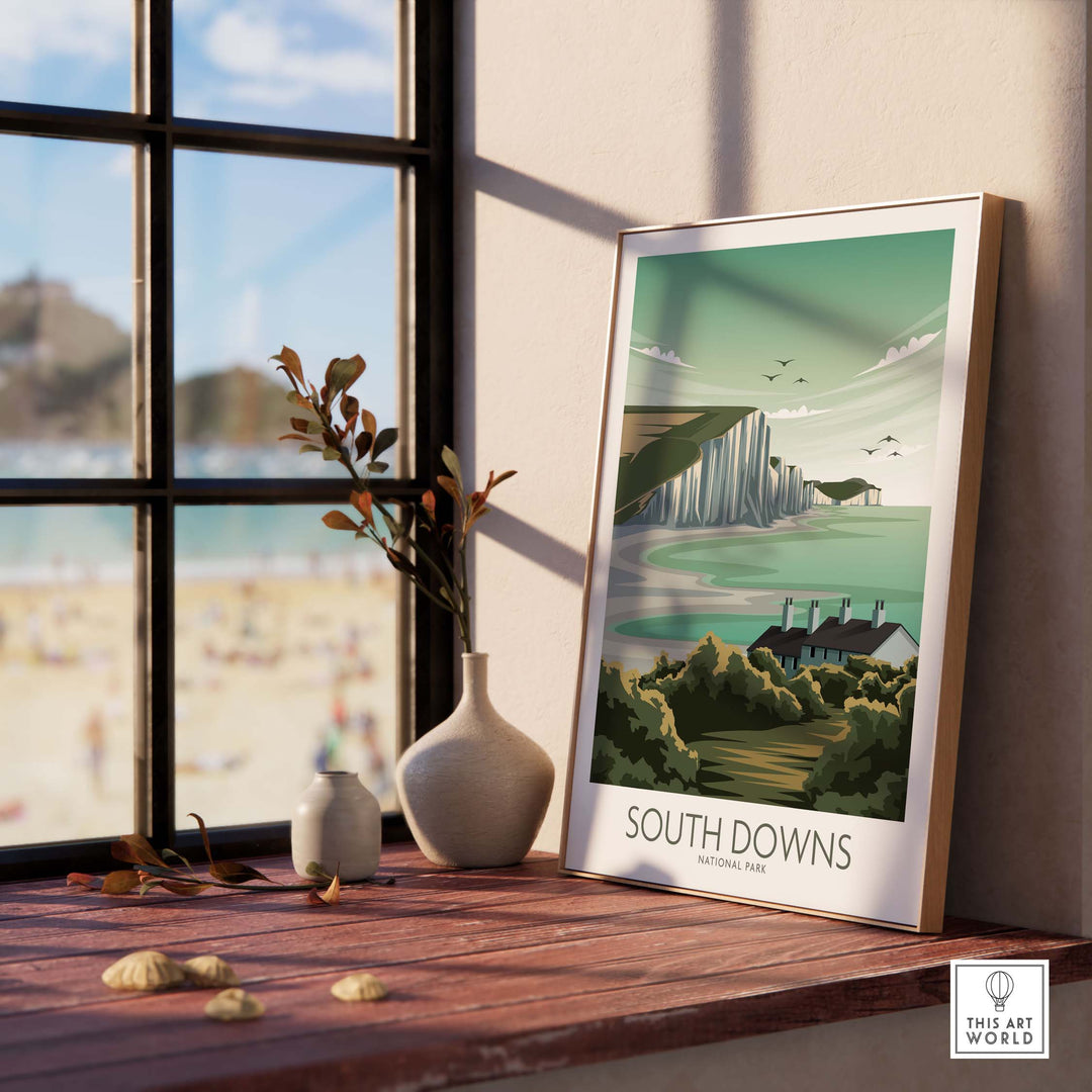 South Downs National Park poster in a modern minimalist style, displayed near a window with a beach view.