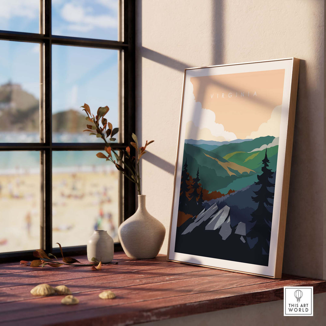 Virginia travel poster print displayed on a wooden table by a window, showcasing lush mountains and trees.