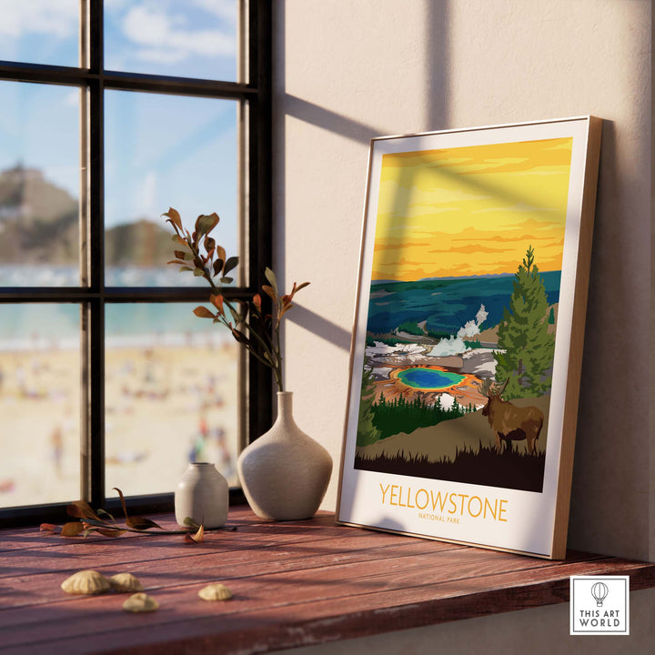 Vintage Yellowstone Park print poster framed on a windowsill, showcasing scenic beauty and nature.