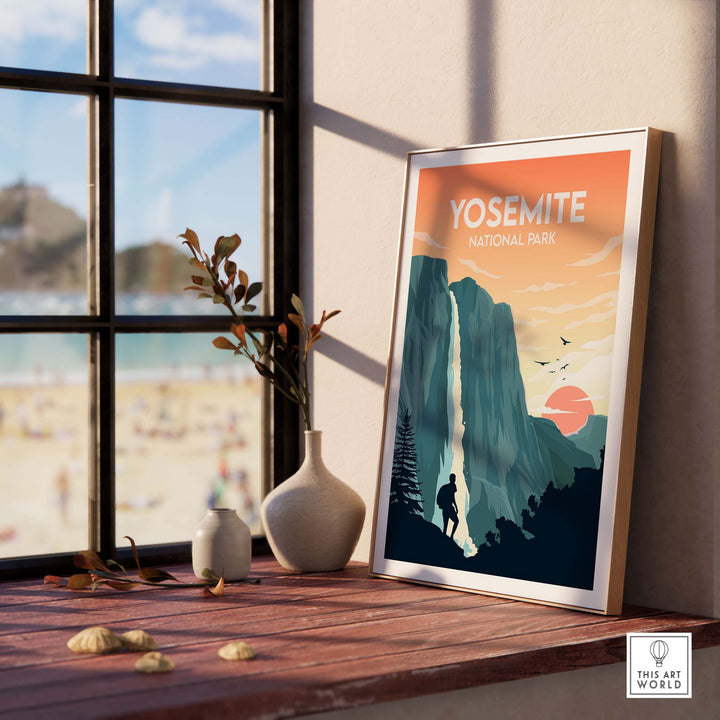 Framed Yosemite National Park poster on a table, showcasing minimalist art and nature-inspired design, perfect for home decor.