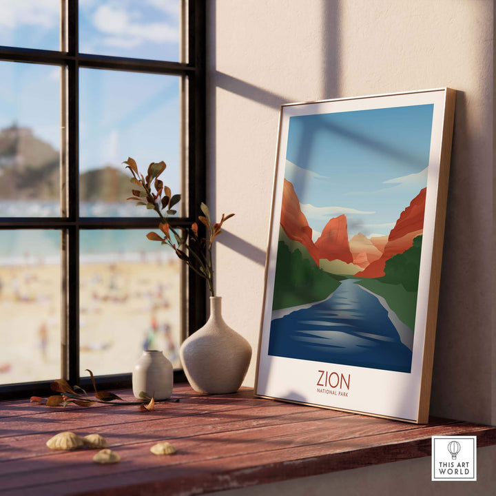 Zion National Park Art Print displayed on a wooden table near a sunny window, featuring minimalist landscape design.