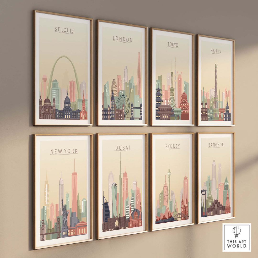 St Louis City Skyline Wall Art print along with other city skylines in pastel tones, framed on a wall.