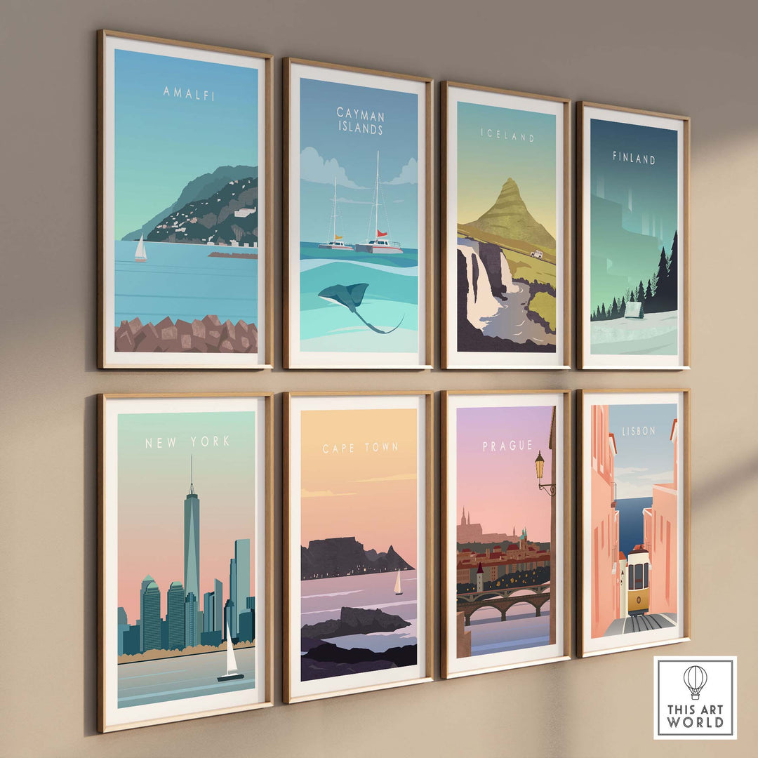 Collection of vintage travel posters featuring Amalfi, Iceland, New York, and more, elegantly framed on a wall.