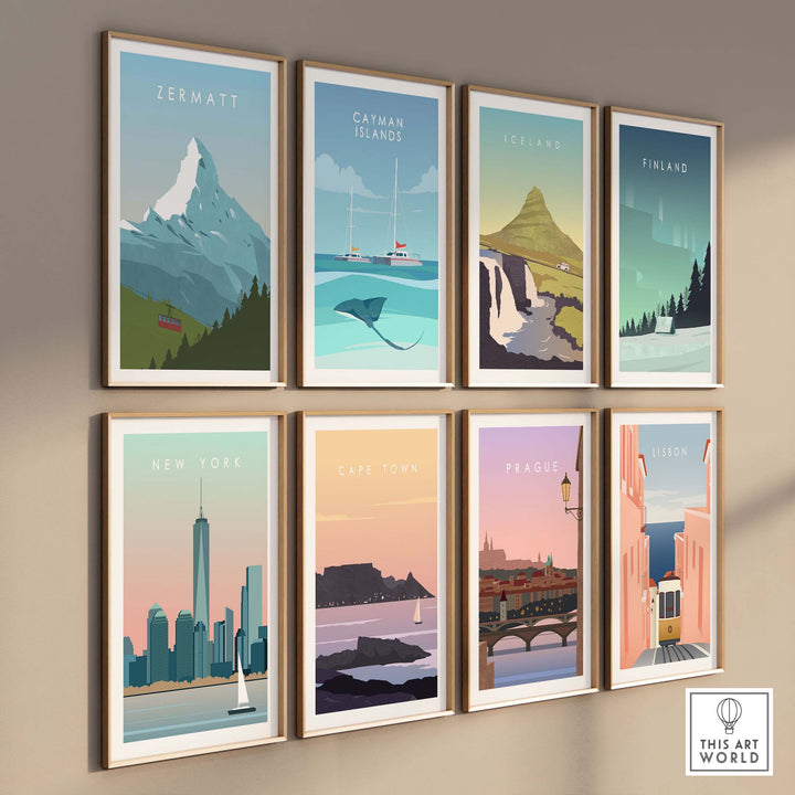 Gallery wall featuring vintage travel posters: Zermatt, Catman Islands, Iceland, Finland, New York, Cape Town, Prague, and Lisbon.