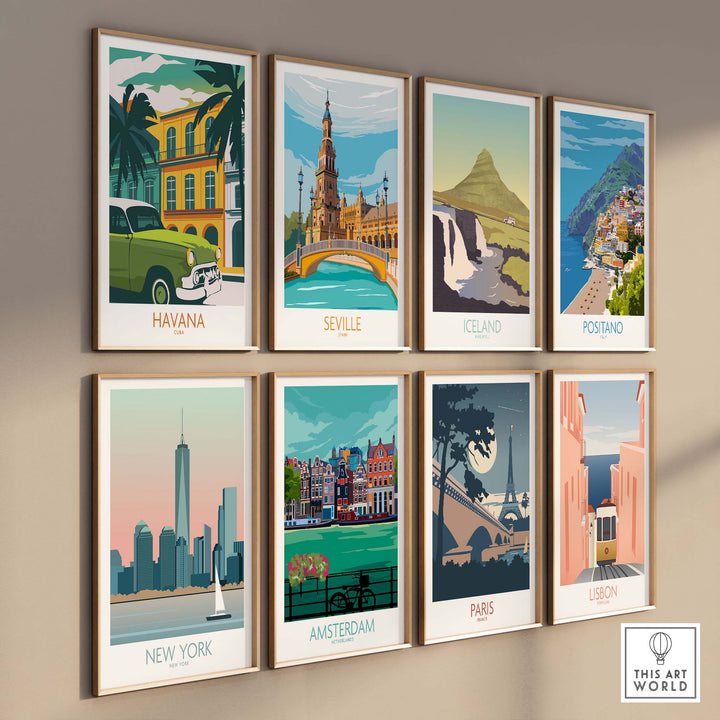 Wall display of vintage travel poster prints featuring Havana, Seville, Iceland, Positano, New York, Amsterdam, Paris, and Lisbon.
