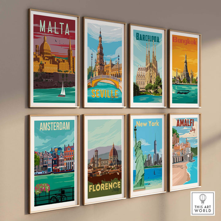 Colorful vintage travel posters including Malta, Barcelona, and New York, beautifully framed on a wall.