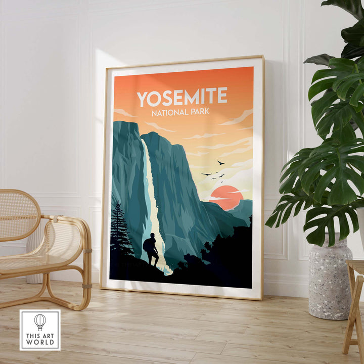 Yosemite National Park poster in a stylish frame, featuring a waterfall and mountain landscape with sunset colors.