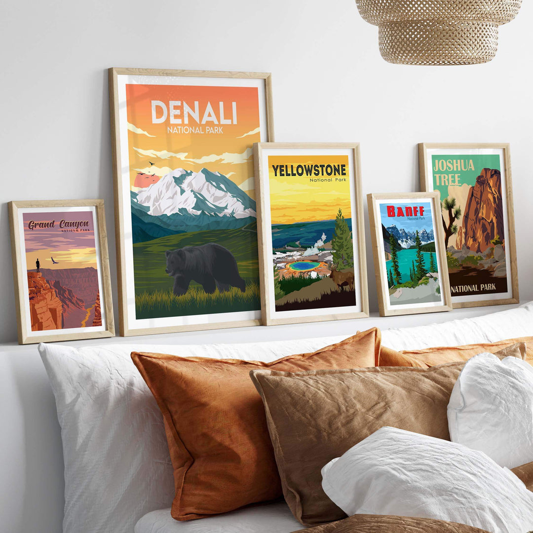 Framed Denali and National Park posters displayed on a wall, showcasing nature-inspired artwork in a cozy home setting.