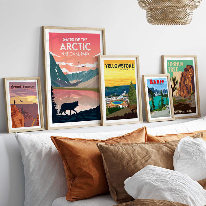Gates of the Arctic poster among framed vintage travel art showcasing national parks, styled in a cozy living space.