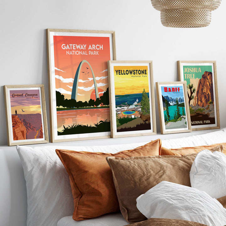 Stylish wall art display featuring Gateway Arch, Yellowstone, and Joshua Tree National Park prints in vintage frames.