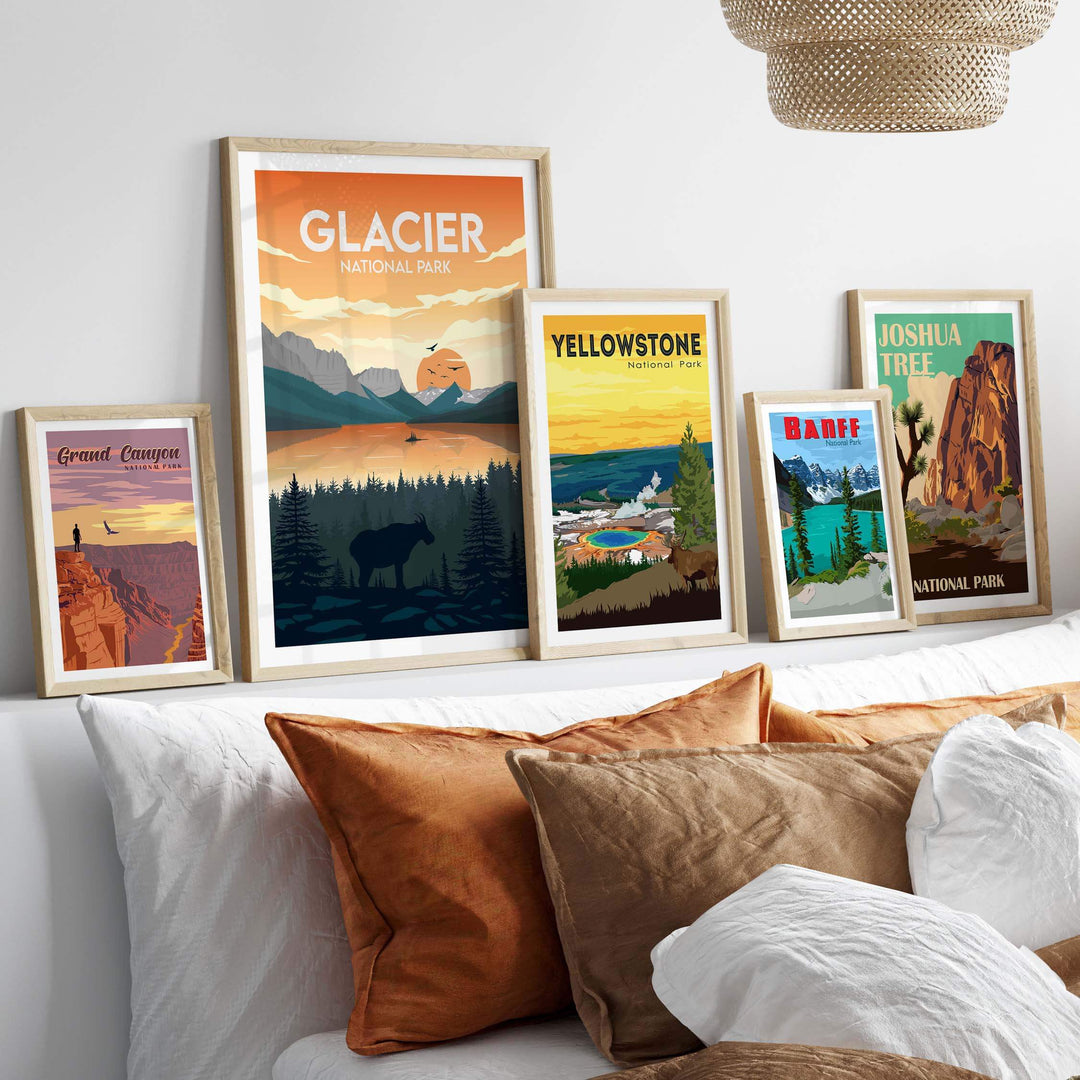 Framed Glacier National Park posters displayed on a wall above a cozy bed with decorative pillows.