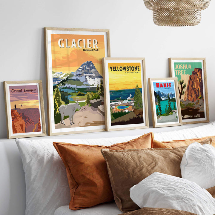 Gallery of vintage-style National Park posters featuring Glacier, Yellowstone, and Joshua Tree, framed on a wall.