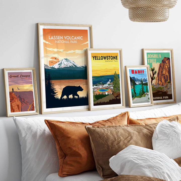 Framed Lassen Volcanic and other national park posters displayed in a cozy bedroom setting.