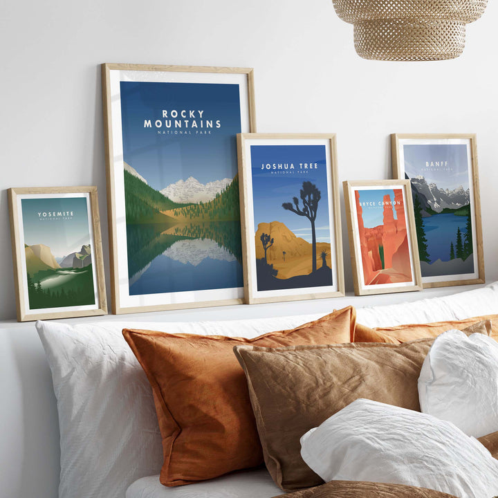 Framed Rocky Mountains National Park Art prints on a stylish wall, showcasing vintage travel design.
