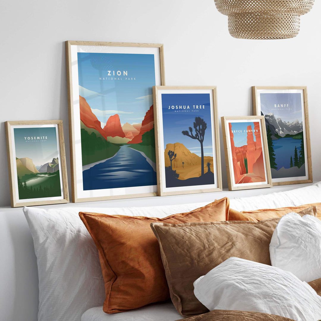 Framed travel posters of Zion National Park and other national parks displayed stylishly in a modern living room.