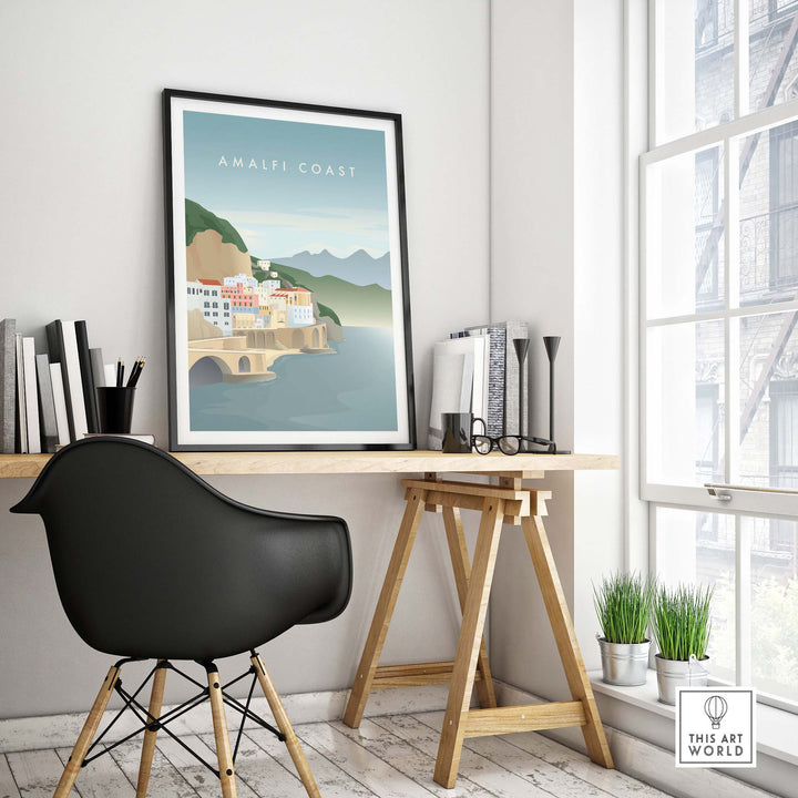 Minimalist Amalfi Coast print on wall above a stylish desk in modern office setting.
