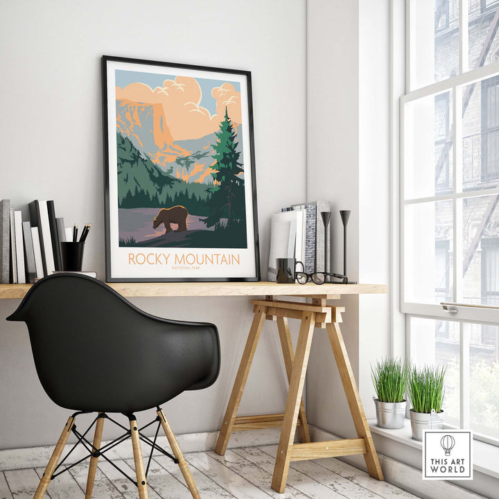 Rocky Mountain National Park poster displayed in a stylish home office with a black chair and natural light.