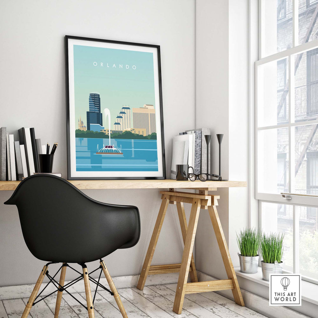 Orlando travel poster print in minimalist style displayed on a desk in a bright room with large windows.